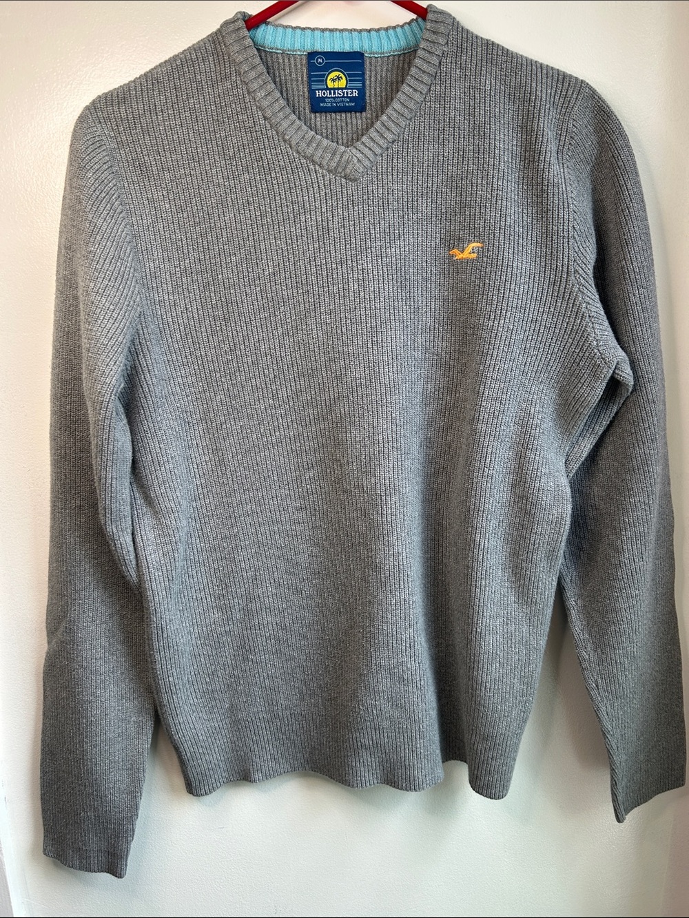 Vintage Hollister Men's  Gray V-Neck Sweater with Yellow Logo Emblem